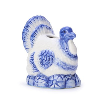 Ceramic turkey candleholder in white with blue accents and floral-patterned base; available in small (5″), medium (7″), and large (9″) sizes.