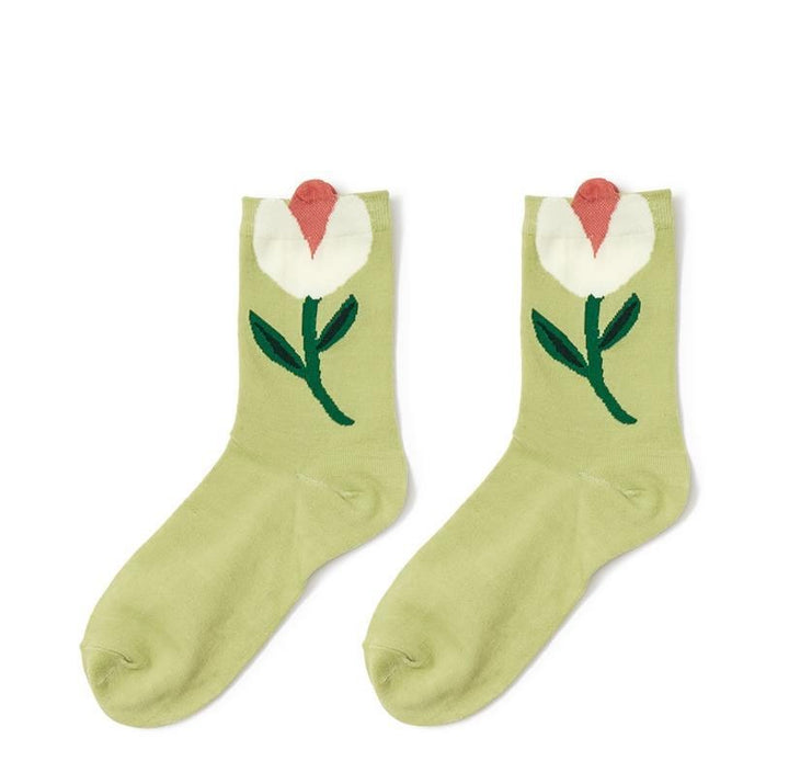 Light green cotton socks with a white, red, and green flower motif on the ankle. Available in sizes S, M, and L.