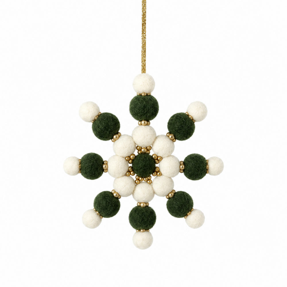 Green, gold, and white felt pom-pom snowflake ornament with gold beads and string.
