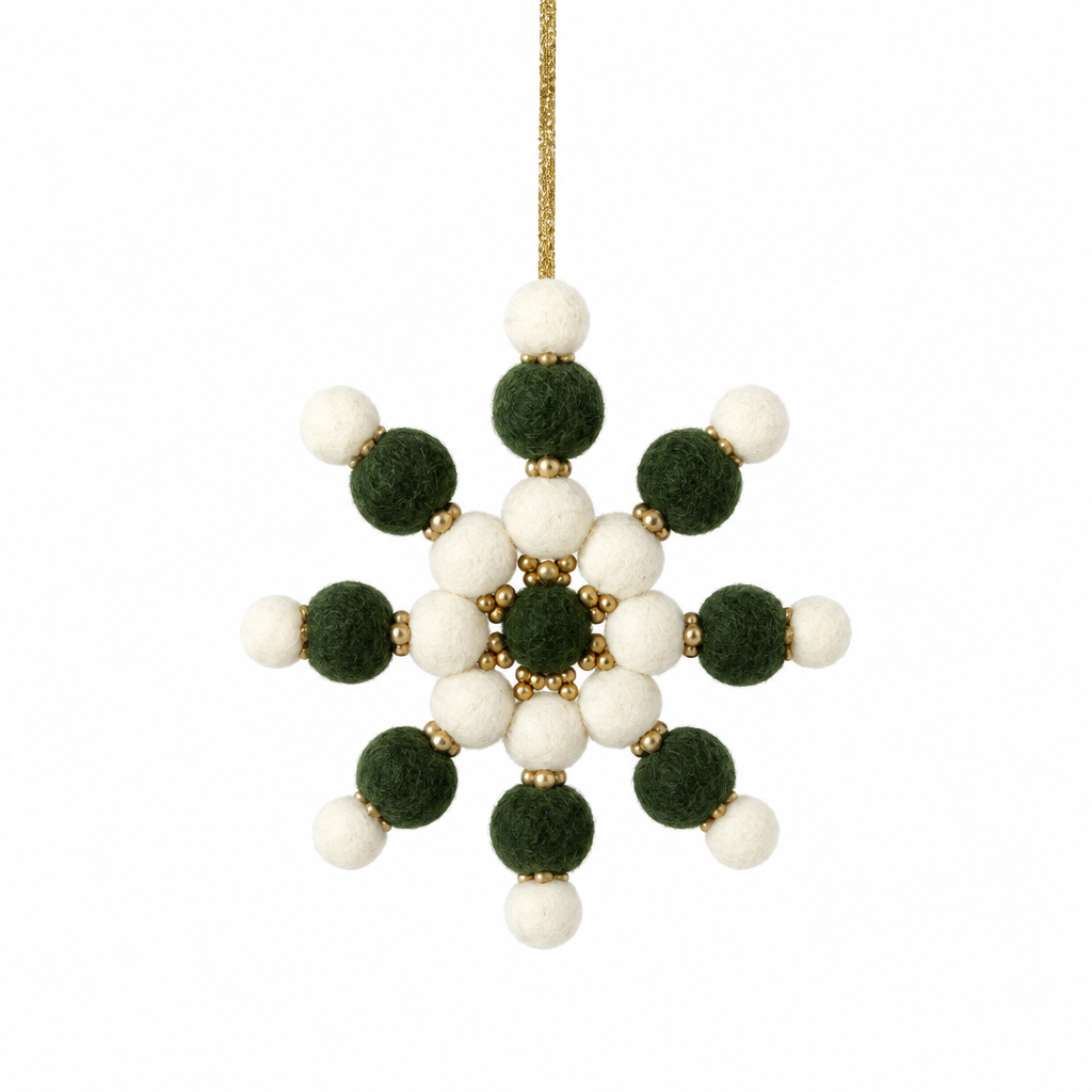 Green, gold, and white felt pom-pom snowflake ornament with gold beads and string.