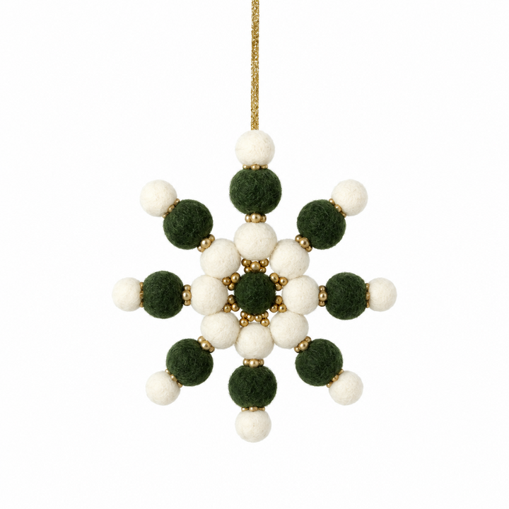 Green, gold, and white felt pom-pom snowflake ornament with gold beads and string.