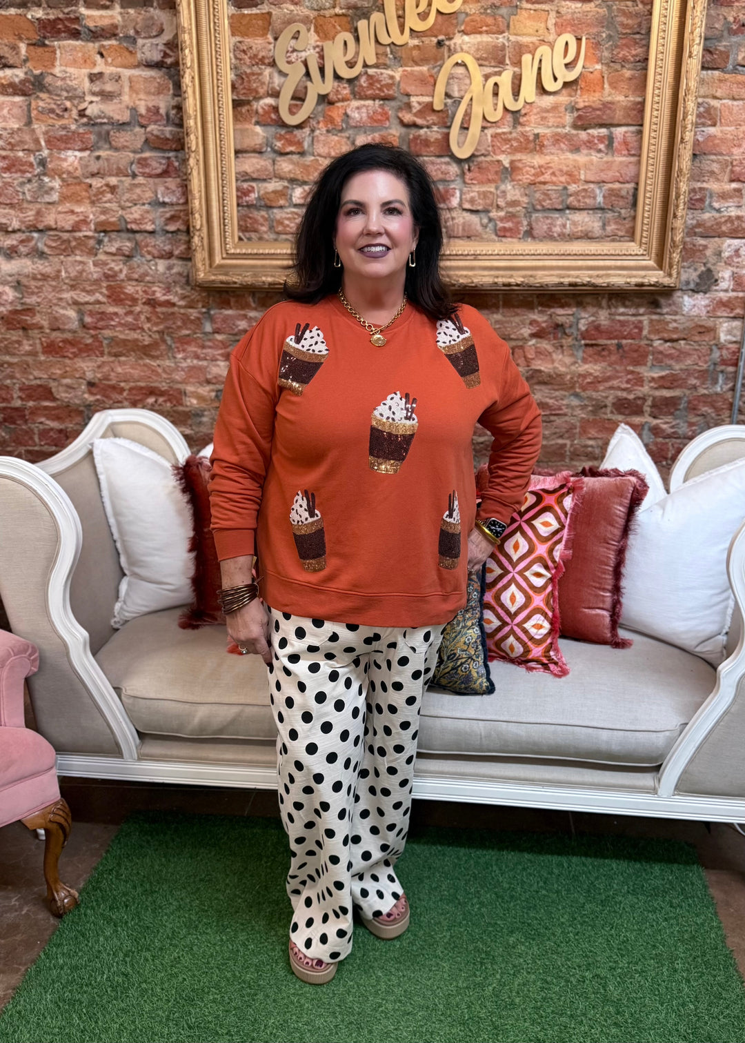 Orange Pumpkin Spice sweatshirt with beaded iced coffee pattern. Available in various sizes.