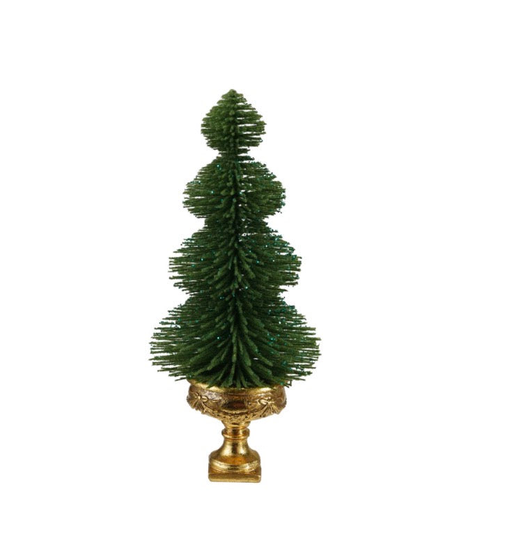Green glittered bottle brush tree on a gold resin urn pedestal.