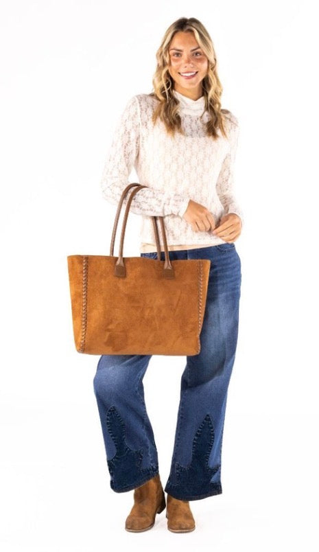 Brown Suede Tote Bag with spacious design and subtle Western-inspired style; available in sizes small, medium, and large.