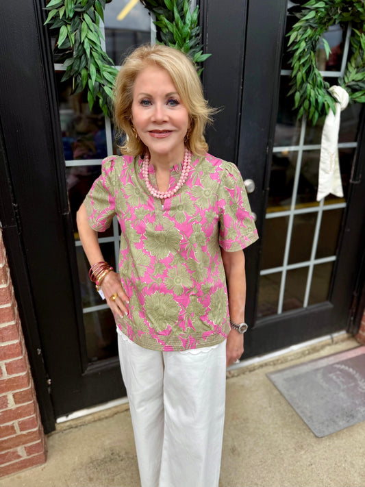 Ramona Garden District Green Top: green floral cotton-blend women’s shirt with ruffle V-neck blouse design. Available in sizes XS–XL.
