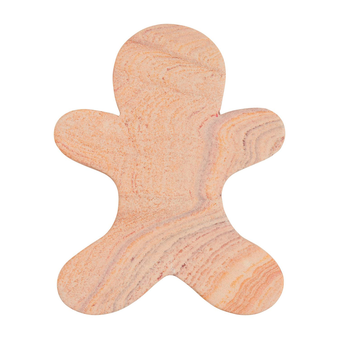 Gingerbread man-shaped marble serving board in swirled tan and pink stone.