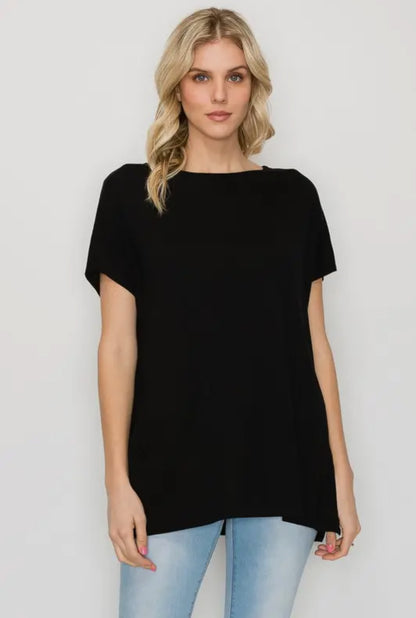 The Perfect Shirt: loose-fitting black rayon blend tunic. Available in sizes XS–XL.