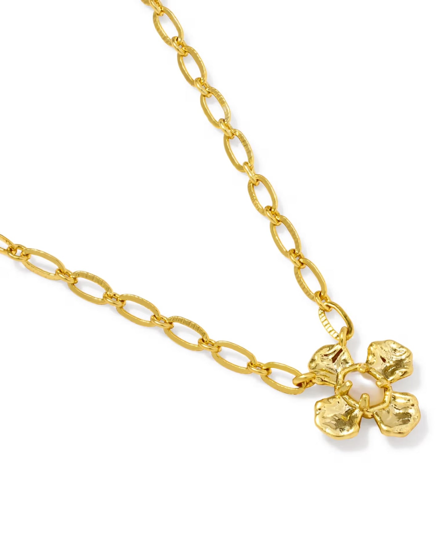 Leanne Short Pendant by Kendra Scott: gold chain necklace with a textured four-petal flower pendant and light pink center. Available in multiple lengths.