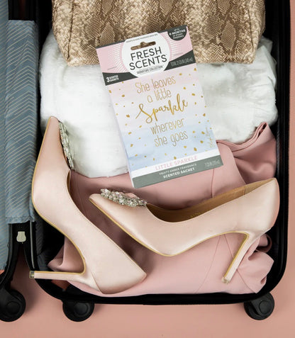 Little Sparkle Scented Sachet with the phrase “She leaves a little sparkle wherever she goes.” Flameless air freshener for lasting fragrance, available in standard and large sizes.