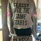 Classy Game Day Sweatshirt with black sequin text, pink/white sequin footballs on sleeves. Available in S-XL.