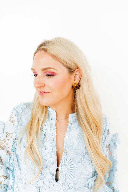 Amelia Earrings—delicate flower studs for sensitive ears, available in small and medium sizes.