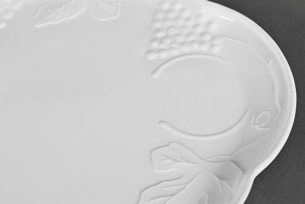 Milk Glass Snack Plate with embossed grapevine and leaf rim; available sizes: 8-inch, 10-inch, and 12-inch.