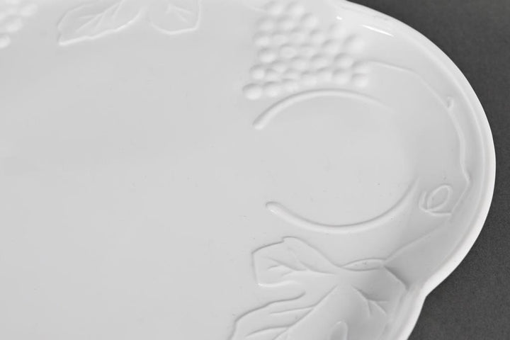 Milk Glass Snack Plate with embossed grapevine and leaf rim; available sizes: 8-inch, 10-inch, and 12-inch.