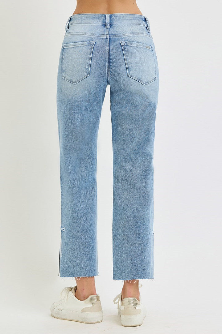 Risen Jeans Tummy Control Straight with Bow, featuring high rise crop fit, frayed hems, and back pockets. Available in sizes 24-32.