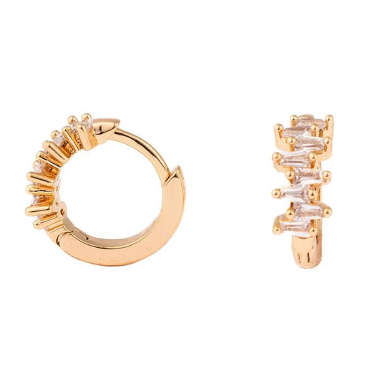 Lightweight gold hoops with front baguette-cut stones. Available in small, medium, and large sizes.