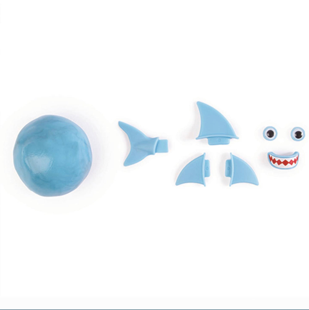 Blue putty and five plastic shark parts; available in one size.