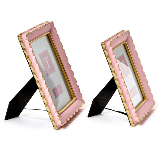 Two scalloped picture frames with pink resin borders and gold edges. Available in 4x6 and 5x7 inch sizes.