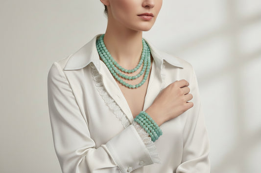 Marbled Green Beaded Jewelry: three-strand necklace available in 16", 18", 20" lengths. Matching bracelet, one size.