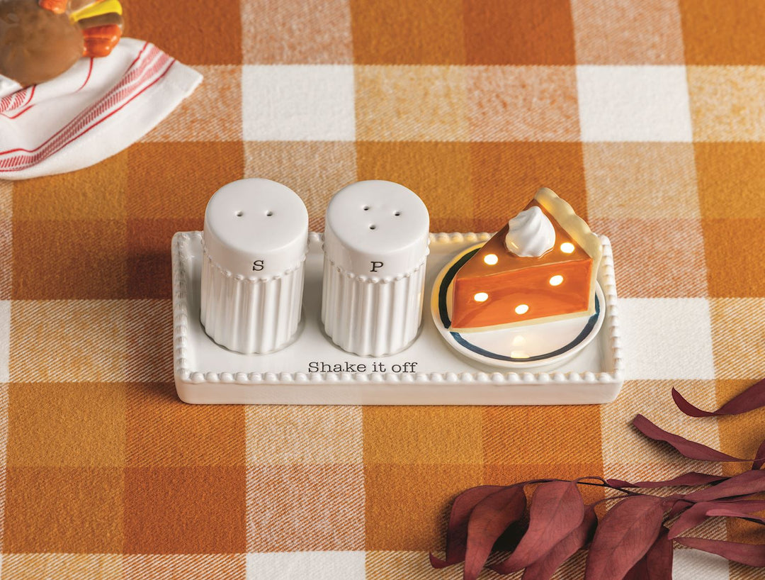 Hand-painted ceramic salt and pepper shakers labeled “S” and “P” on a tray reading “Shake it off.” Available in standard shaker size.