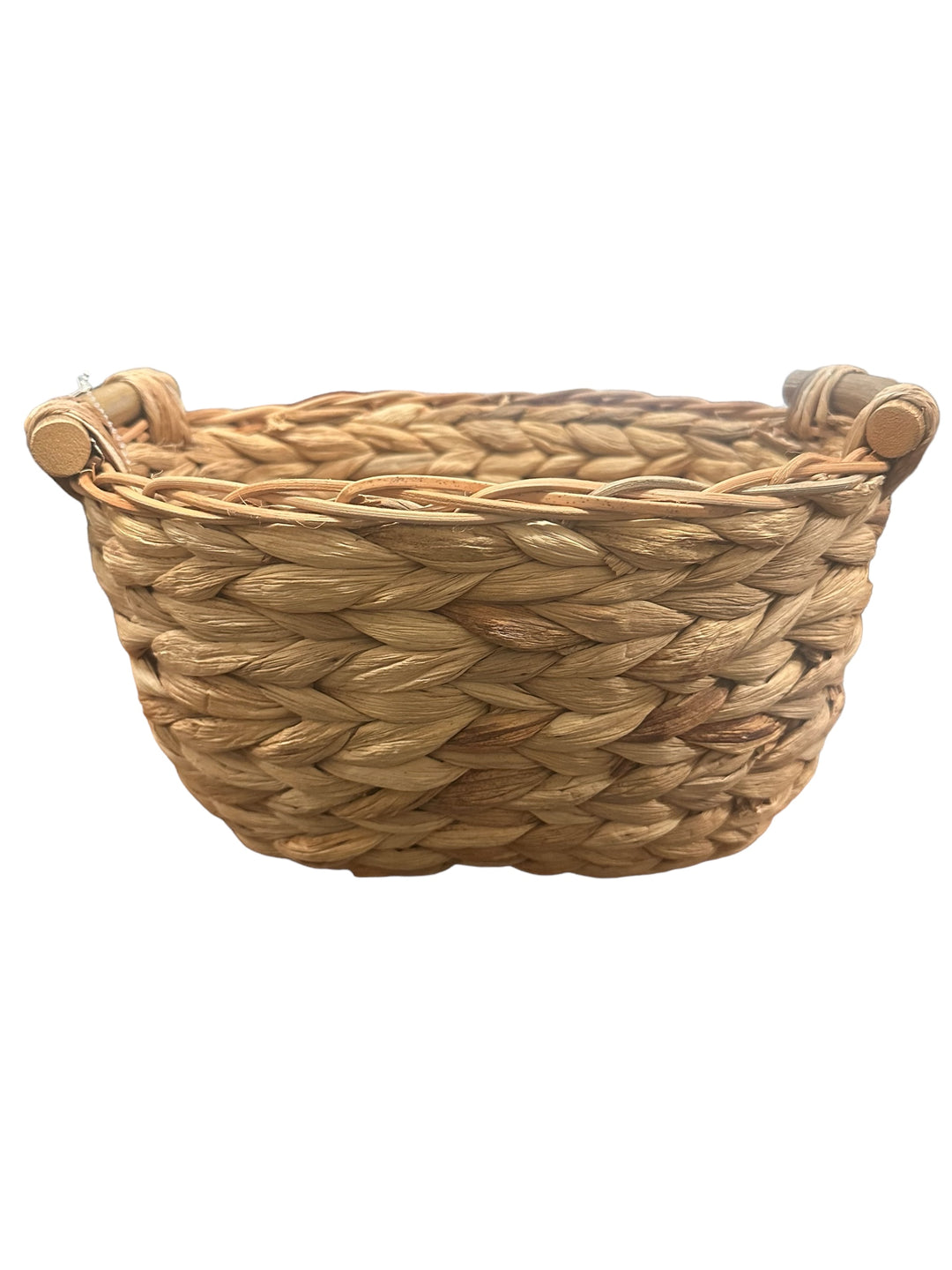 Round wicker basket with rolled side handles, made from natural straw fibers. Available in small, medium, and large sizes.