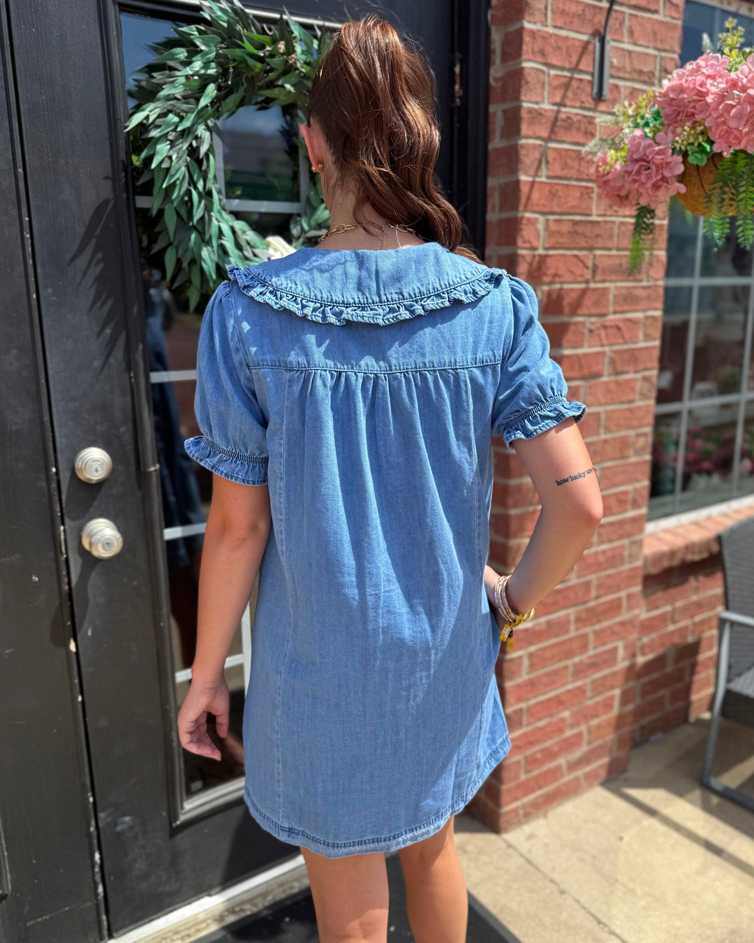 Denim Ruffle Collar Mini Dress featuring ruffled collar detail; available in sizes XS-XL.