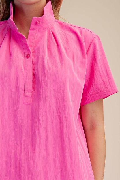 Pink Stand Collar Short Sleeves Shirt with neckline pleats and partial button placket. Available in sizes S-XL.