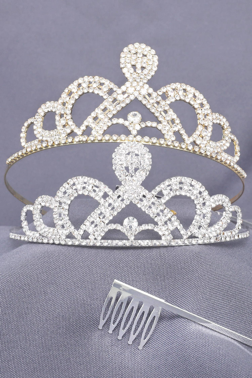 Two silver crystal rhinestone scalloped princess comb tiaras, each with clear plastic comb; available in standard size.