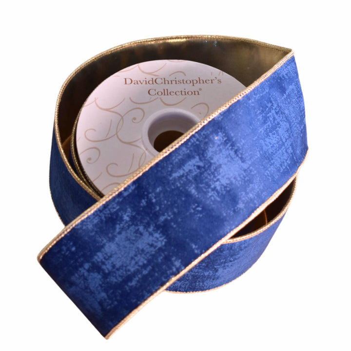 Textured navy blue velvet ribbon with gold edges, partially unspooled, labeled “David Christopher’s Collection,” size 1.5″ x 10yd.