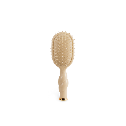 Mini Detangler Brush for Medium Hair in Tan with rectangular paddle, rounded bristles, twisted handle. Available in mini size.
