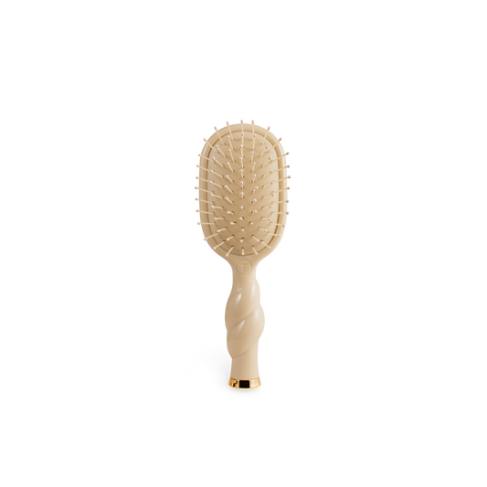Mini Detangler Brush for Medium Hair in Tan with rectangular paddle, rounded bristles, twisted handle. Available in mini size.
