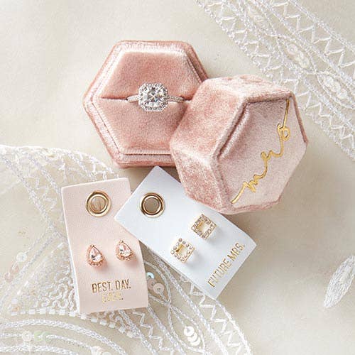 Wedding-themed earrings on "BEST DAY EVER" and "FUTURE MRS." cards. Available sizes: small, medium.