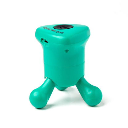 Small turquoise massager with three short legs, rounded body, button and charging port on top. Available in multiple sizes.
