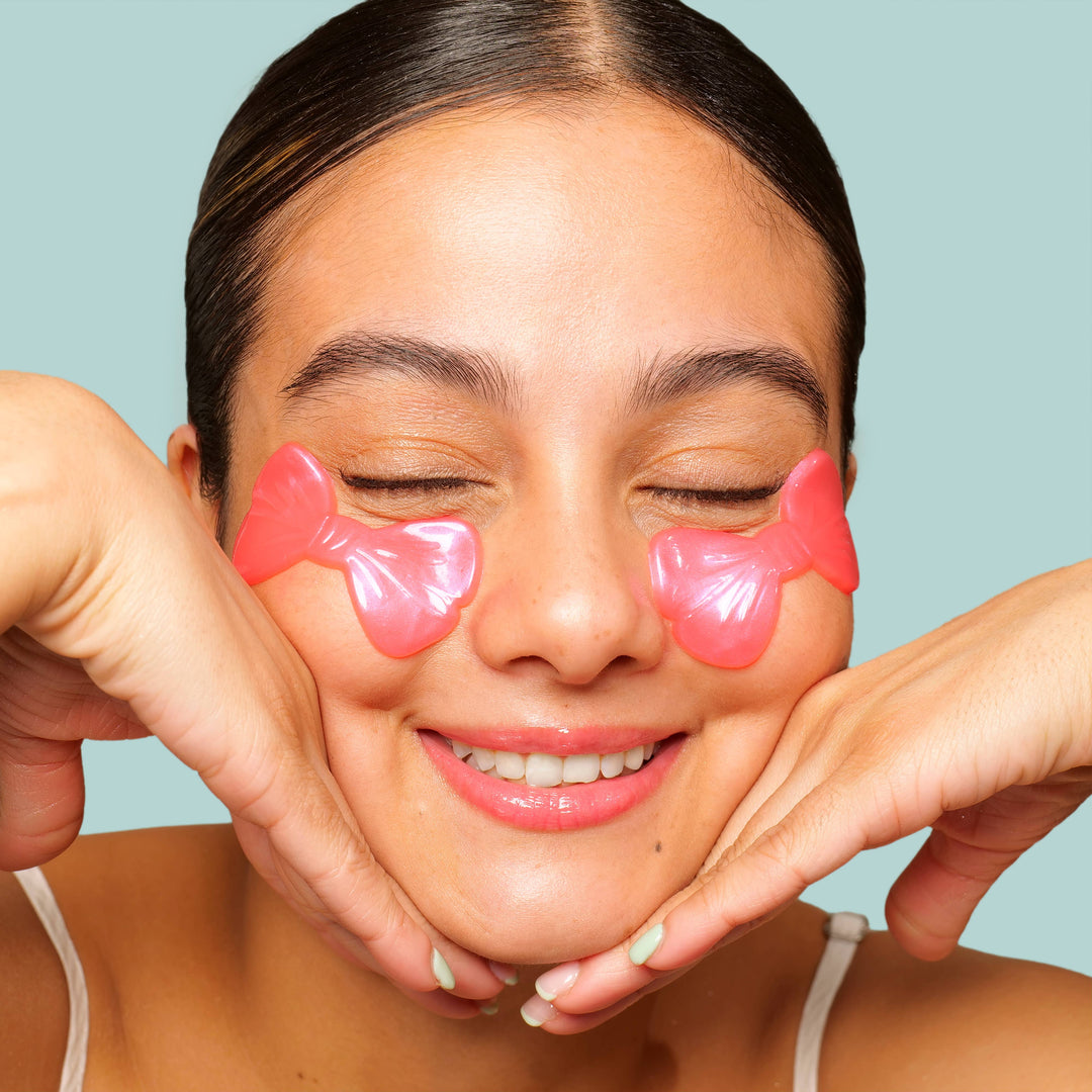 Pretty in Pink! Brightening Undereye Masks, bow-shaped, rosewater-infused. Available in packs of 8.