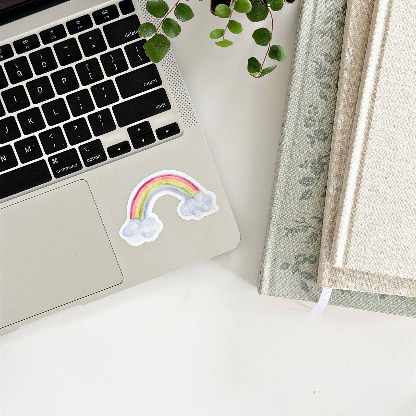 Rainbow sticker for laptops, available in small (2x2"), medium (3x3"), and large (4x4") sizes.