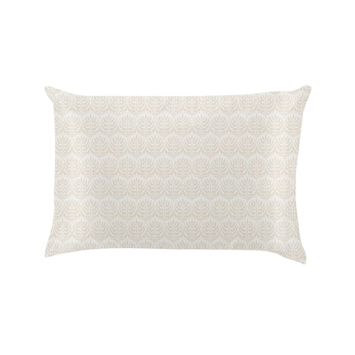 Silky pillowcase in pale beige with light leaf designs; available in standard and king sizes. Reduces frizz; enhances beauty sleep.
