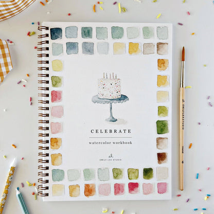 Celebrate Watercolor Workbook is spiral-bound with a cake illustration and vibrant paint swatches on the cover. Filled with festive party illustrations for beginner painting. Sizes available: not specified.