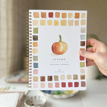 Spiral-bound Autumn watercolor workbook with pumpkin cover and fall-colored square border. Available in multiple sizes.