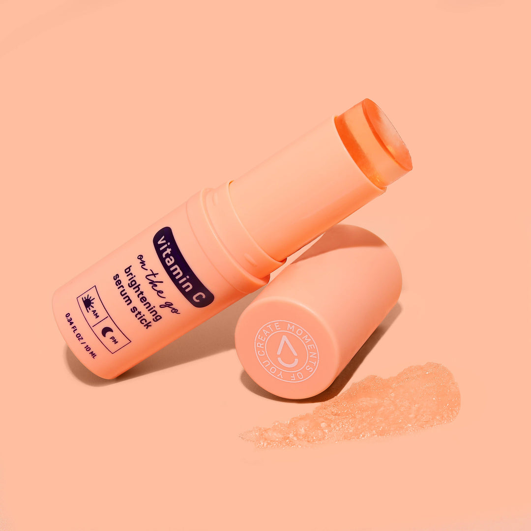 The Glow Vitamin C Brightening Face Serum Stick with its cap off, showing the serum stick. Available in 10g and 20g sizes.
