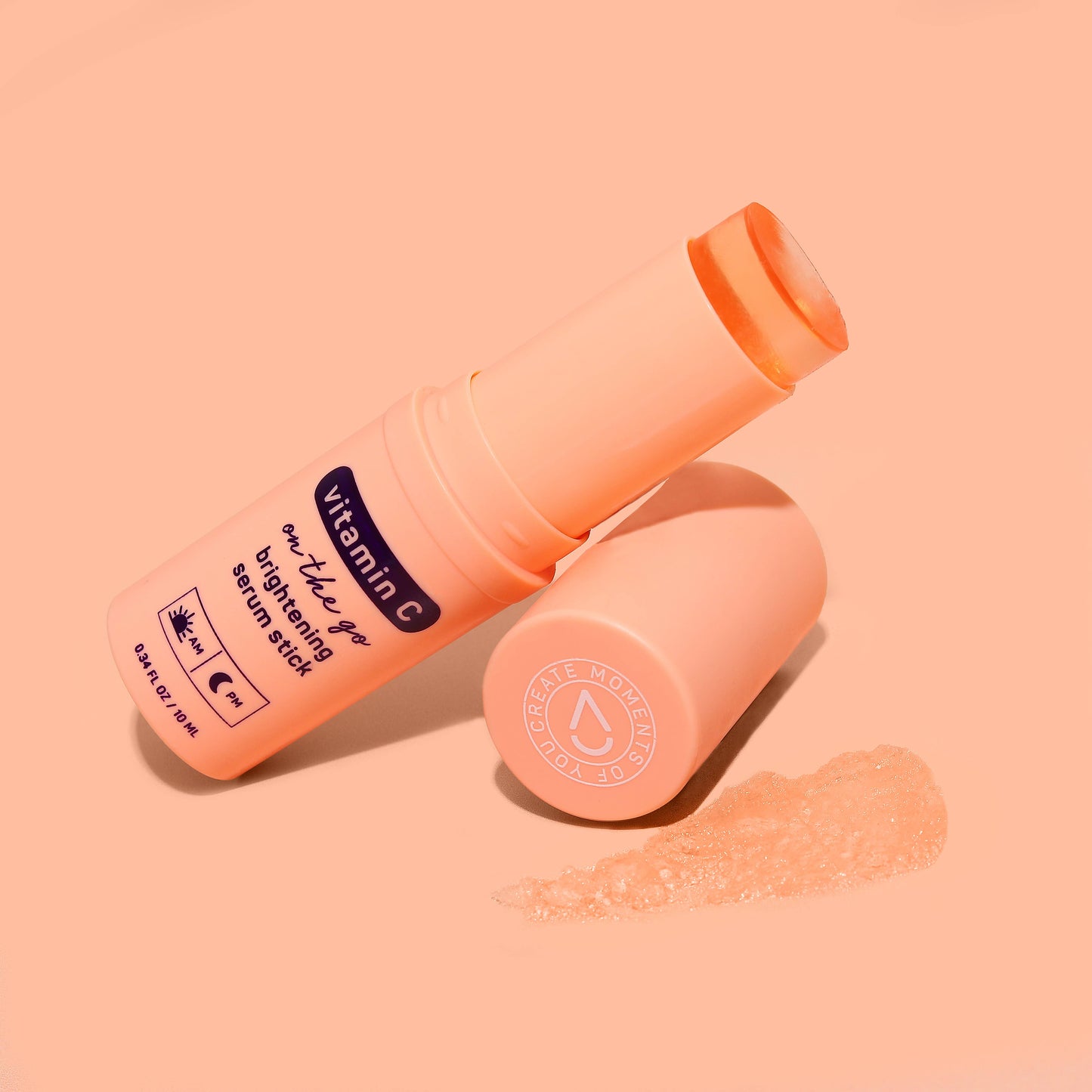 The Glow Vitamin C Brightening Face Serum Stick with its cap off, showing the serum stick. Available in 10g and 20g sizes.