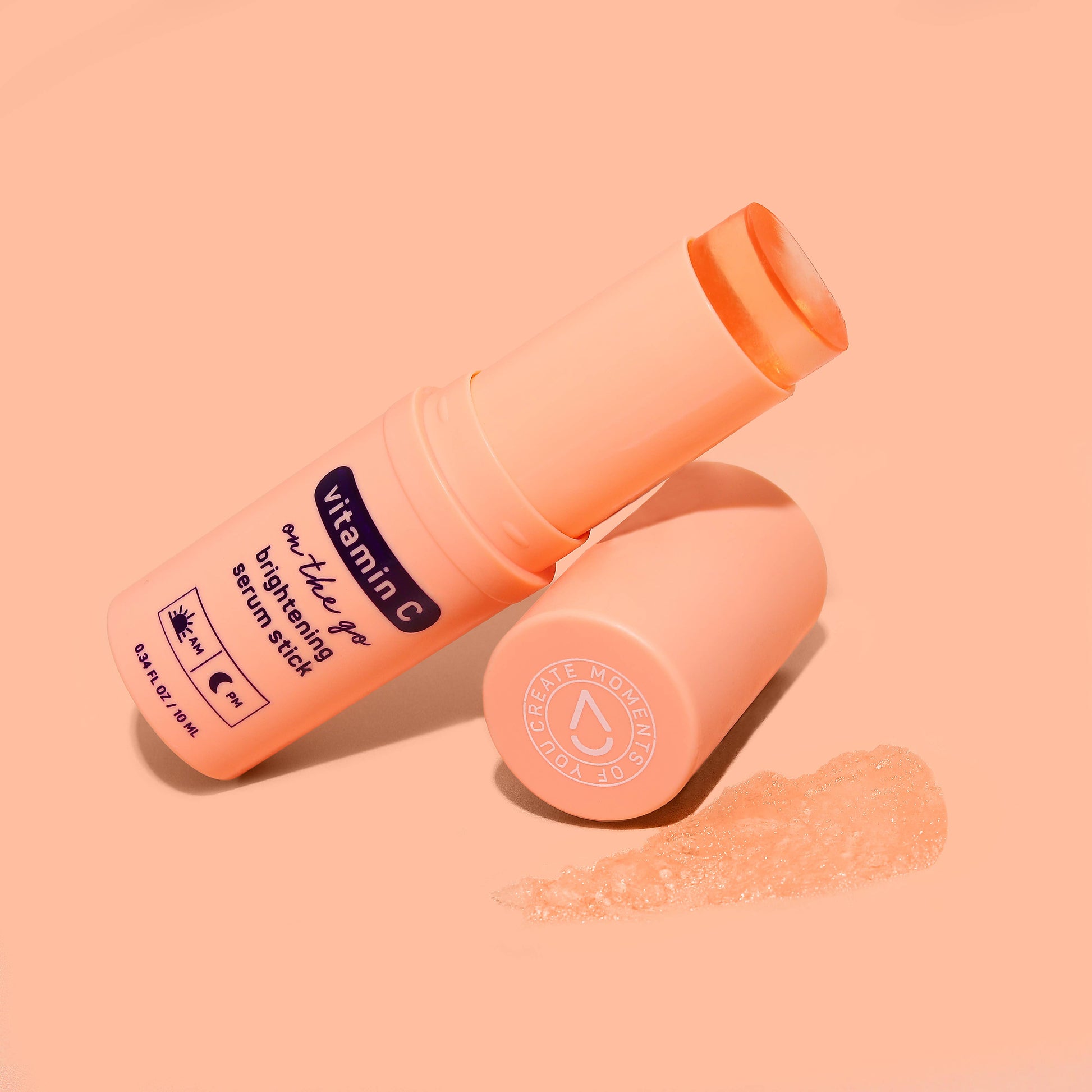 The Glow Vitamin C Brightening Face Serum Stick with its cap off, showing the serum stick. Available in 10g and 20g sizes.