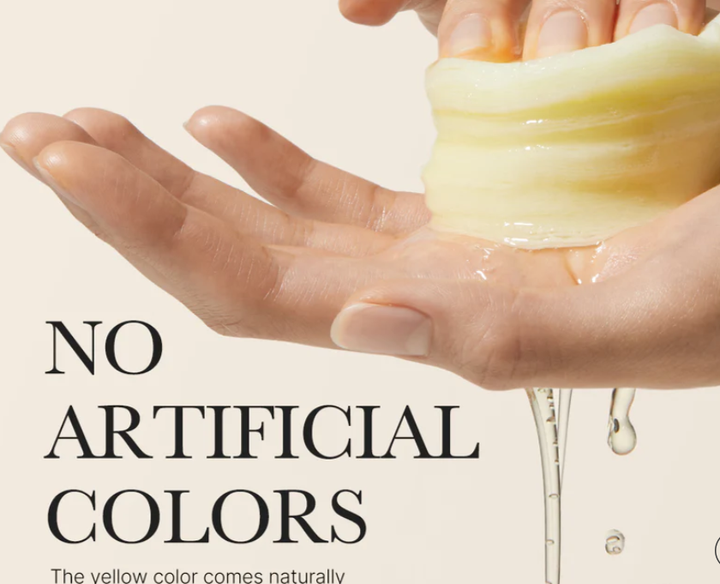 Yellow MEDICUBE Deep Vita C Pad squeezed, liquid released. Text: "NO ARTIFICIAL COLORS. Available in 70 &amp; 140 pad sizes.