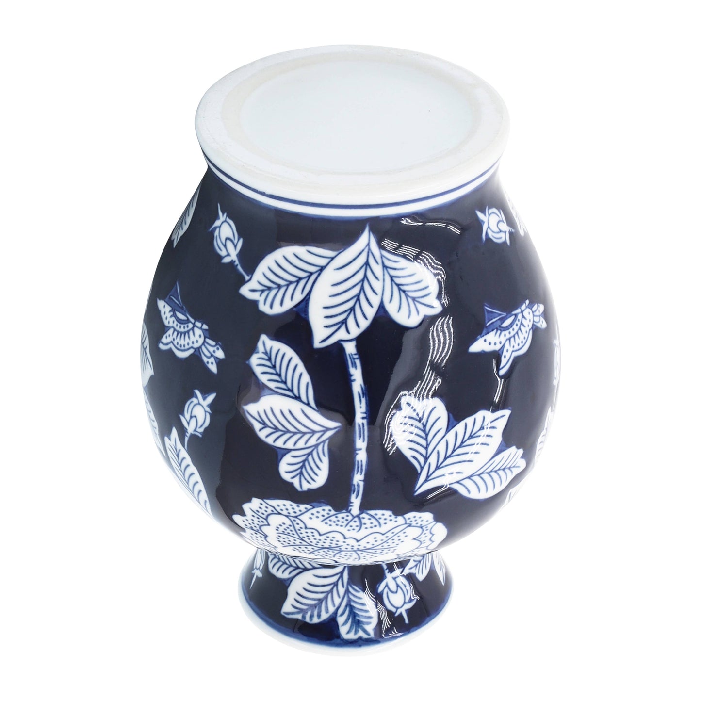 Blue ceramic chinoiserie vase, 9 in., rounded shape, blue and white floral pattern, wide base, white rim.