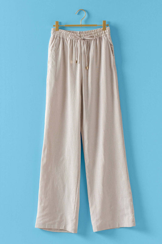 Natural Linen Blend Wide Leg Drawstring Pants with elastic waistband, available in sizes S-XL. Ideal for resort wear.