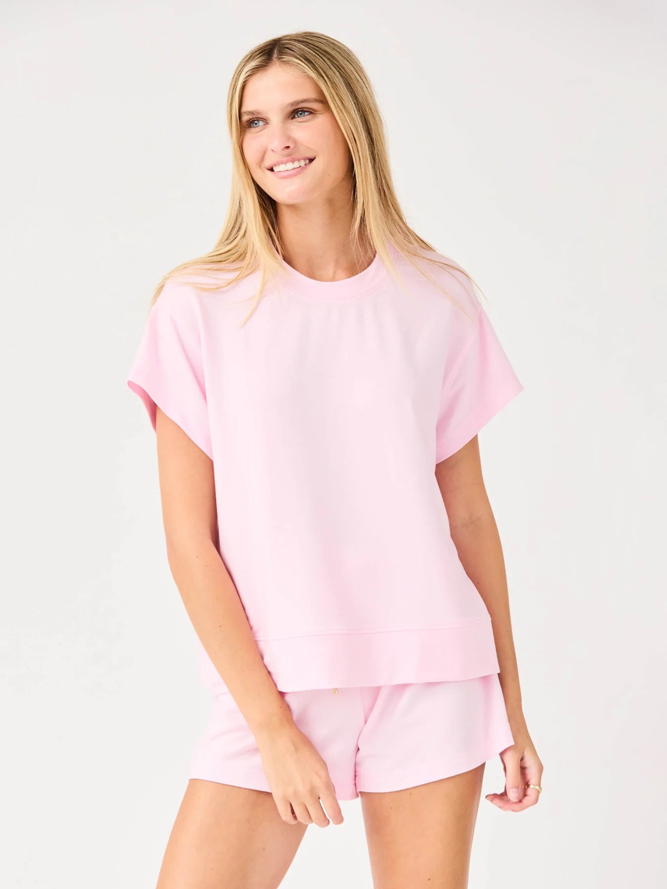 Emily Pink Set: light pink short-sleeve top and matching drawstring shorts. Available in sizes XS–XL.
