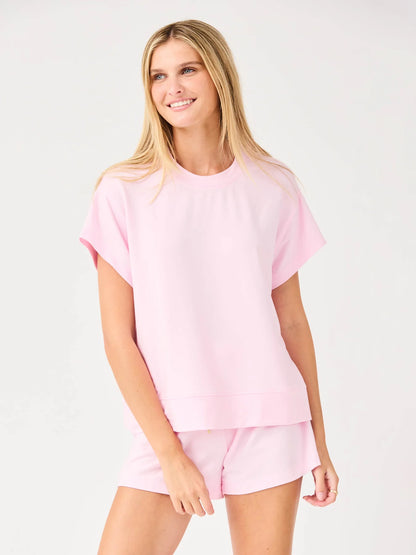 Emily Pink Set: light pink short-sleeve top and matching drawstring shorts. Available in sizes XS–XL.