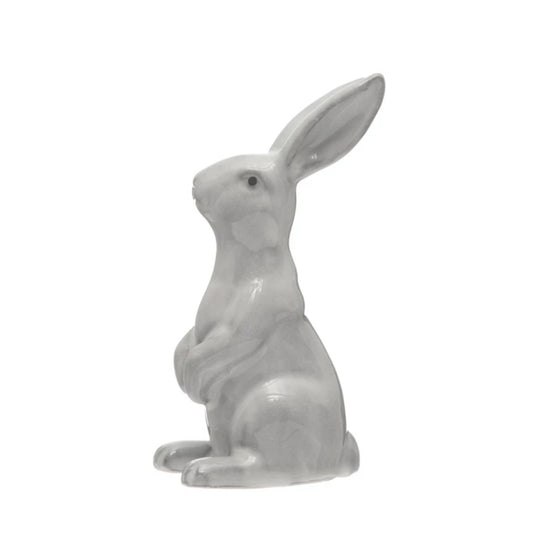 Glossy white stoneware rabbit with raised paws and upright ears. Available in 8" and 12" sizes. Polished reactive glaze finish.