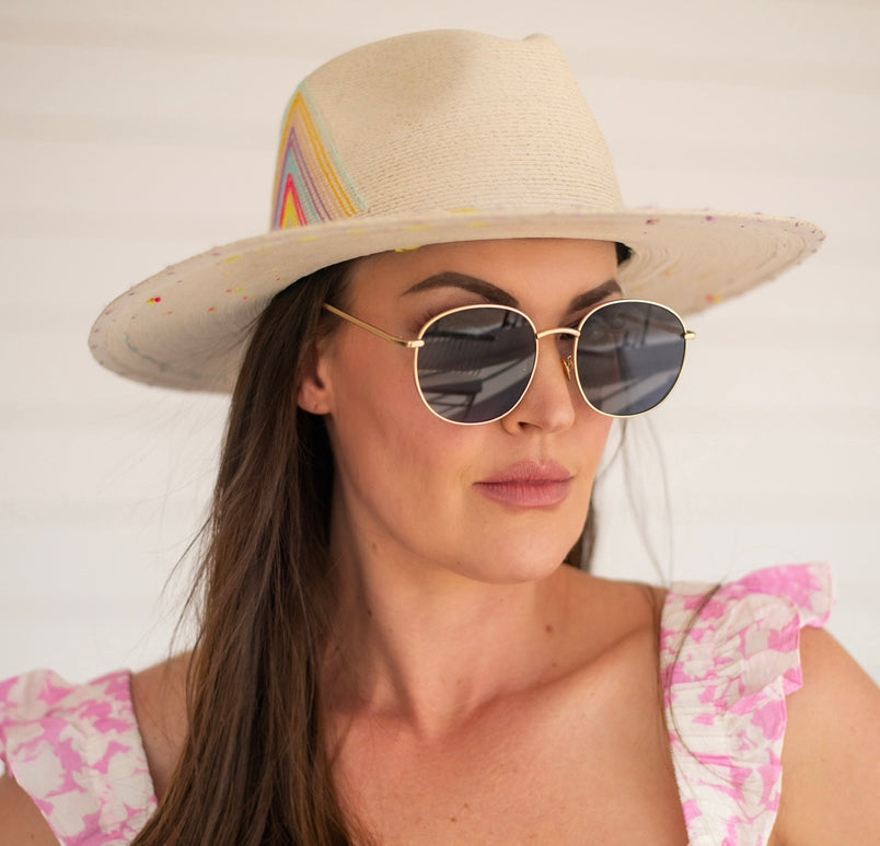 Gold metal-framed Georgie sunglasses available in small, medium, and large sizes.