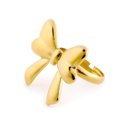 Adjustable gold bow-shaped ring with smooth, shiny finish. Available in multiple sizes.