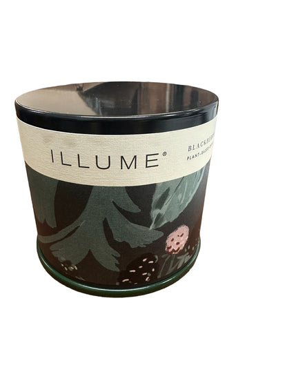 11.8 oz Vanity Tin candle in dark green and brown floral tin, black lid, cream label reading "ILLUME Black Amber.