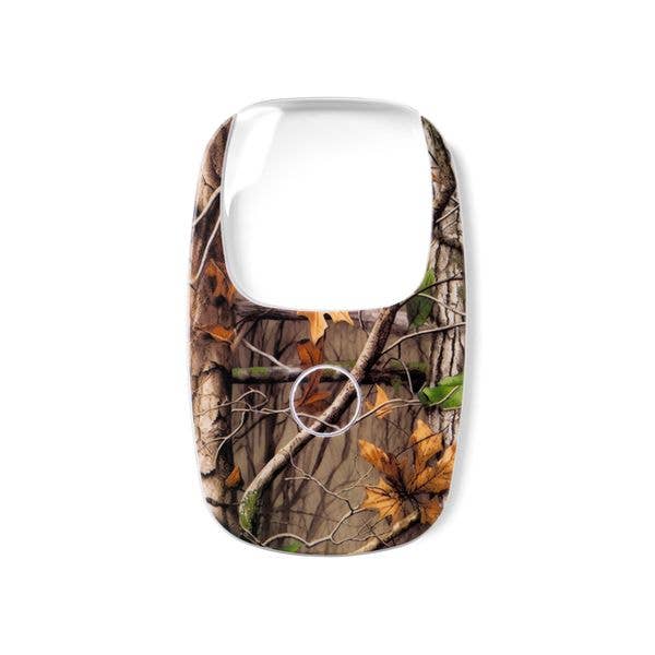 Camouflage-patterned phone faceplate cover with tree bark, branches, green leaves, and brown autumn leaves; available in multiple sizes.